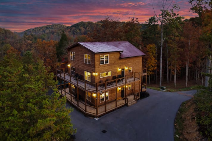 A better look at your private mountain escape — wraparound decks, towering trees,… Sevierville, Tennessee Cabin Rental - Gallery Image #1