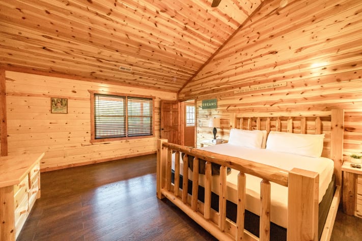 Bedroom 4: king bed, Tv and full bathroom Pigeon Forge, Tennessee Cabin Rental - Gallery Image #34