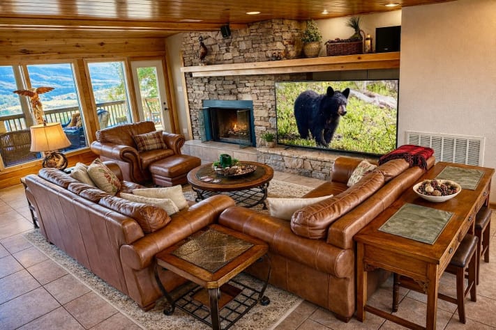 Great Room second floor. Cozy up to a wood burning fire with Roku TV and front and… Pigeon Forge, Tennessee Lodge Rental - Gallery Image #20