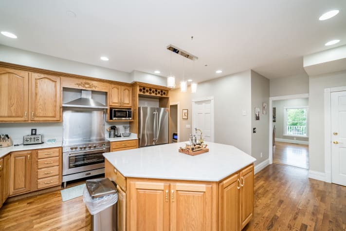 Large island in the kitchen providing plenty of room for all! Sevierville, Tennessee Cabin Rental - Gallery Image #27