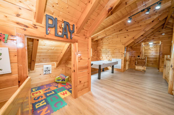 Children's play area at the top floor common space Pigeon Forge, Tennessee Cabin Rental - Gallery Image #32