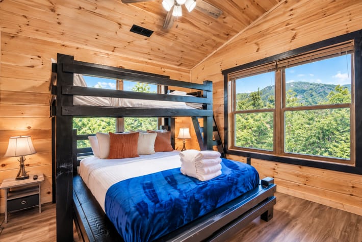 Perfect for kids, teens, or anyone who loves a good bunk bed — this twin-over-queen… Sevierville, Tennessee Cabin Rental - Gallery Image #24