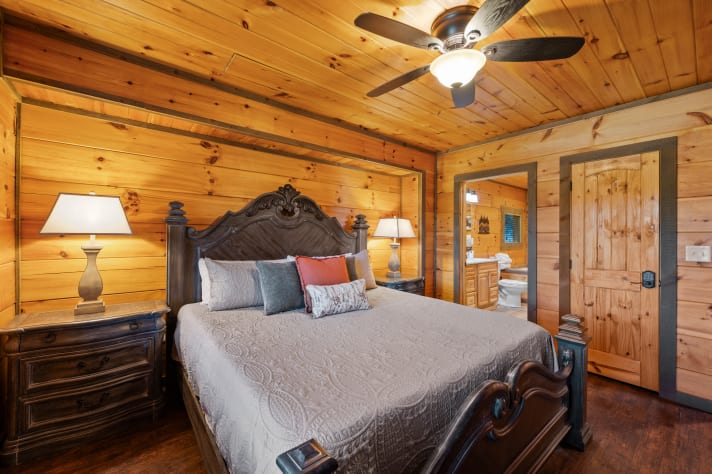 Master suite has a private connected bathroom with shower, soaker tub, and fireplace! Sevierville, Tennessee Cabin Rental - Gallery Image #22