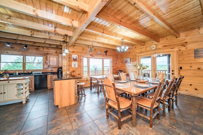 Large dining room with two tables Pigeon Forge, Tennessee Cabin Rental - Gallery Image #15