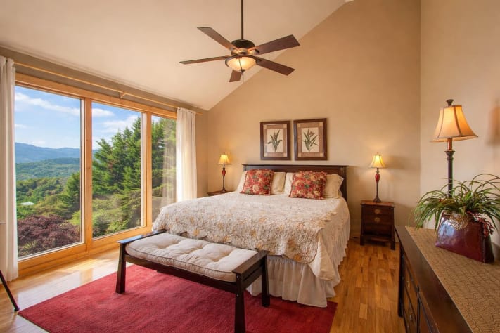Third Floor King Bedroom with Chilhowee Mtn view. Pigeon Forge, Tennessee Lodge Rental - Gallery Image #32