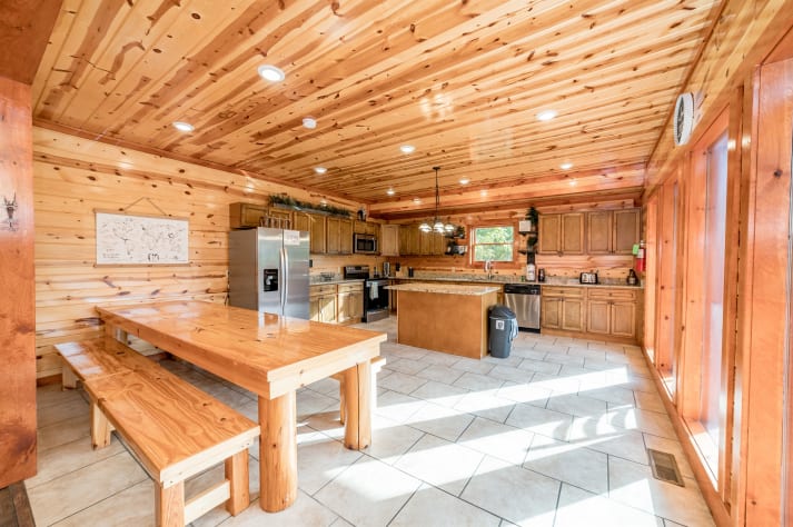 Large kitchen area with plenty of seating for the whole family Pigeon Forge, Tennessee Cabin Rental - Gallery Image #13