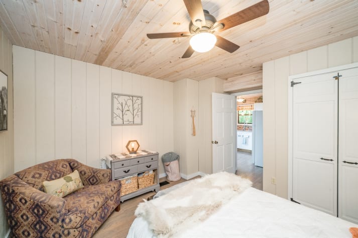 Main level bedroom closet and door.  Pigeon Forge, Tennessee Cabin Rental - Gallery Image #28