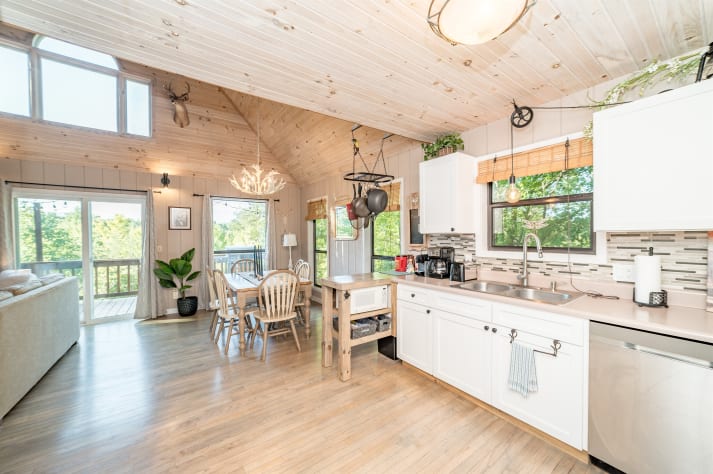 Kitchen view into dining room Pigeon Forge, Tennessee Cabin Rental - Gallery Image #16