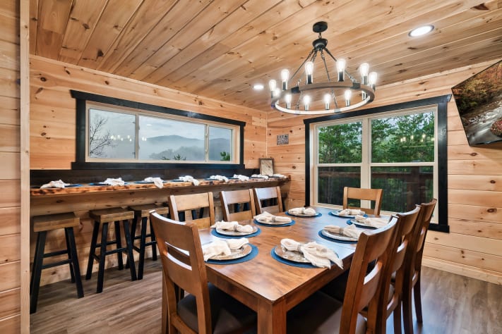 Gather everyone around one table with seating for 16+ indoors and additional seating… Sevierville, Tennessee Cabin Rental - Gallery Image #7
