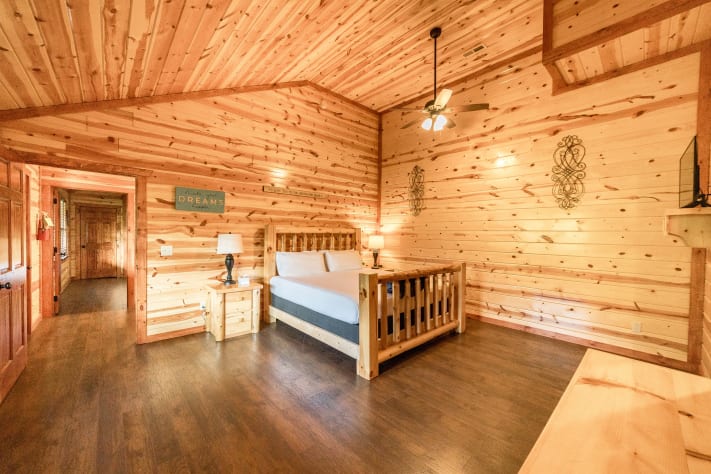 Bedroom 4: king bed, Tv and full bathroom Pigeon Forge, Tennessee Cabin Rental - Gallery Image #33