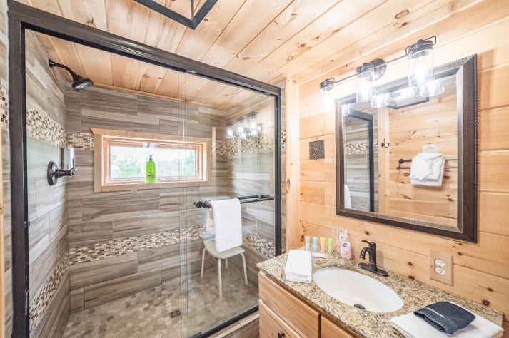 Bathroom located on main level. Pigeon Forge, Tennessee Cabin Rental - Gallery Image #36