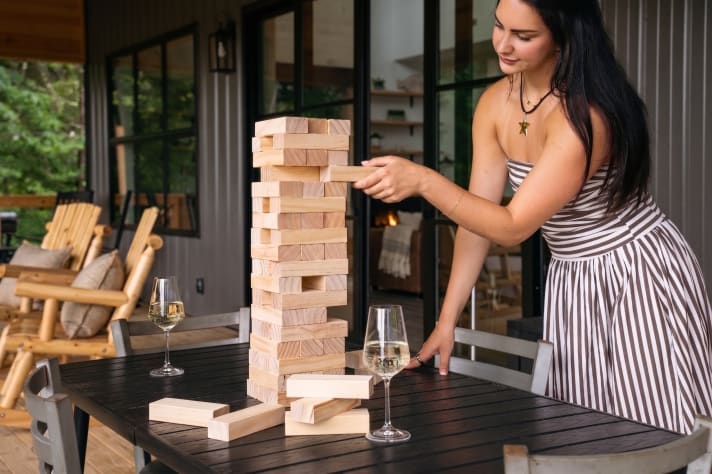 Outdoor games on the deck — giant Jenga and lake views while you play. Douglas Lake, Tennessee Cabin Rental - Gallery Image #24
