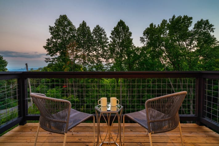 Enjoy the Sunrise and the view on the Loft Balcony. Sevierville, Tennessee Cabin Rental - Gallery Image #5