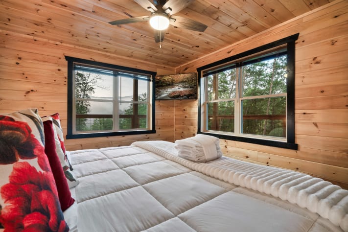 One of three private king suites, each with its own ensuite bathroom — because everyone… Sevierville, Tennessee Cabin Rental - Gallery Image #19