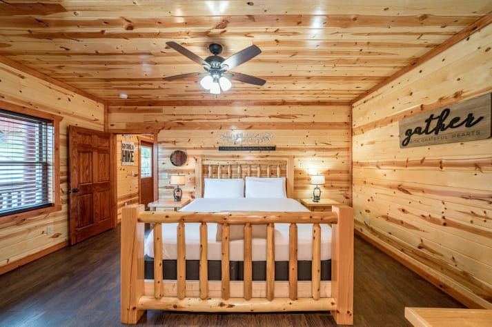 Bedroom 1 with TV and full bathroom Pigeon Forge, Tennessee Cabin Rental - Gallery Image #16
