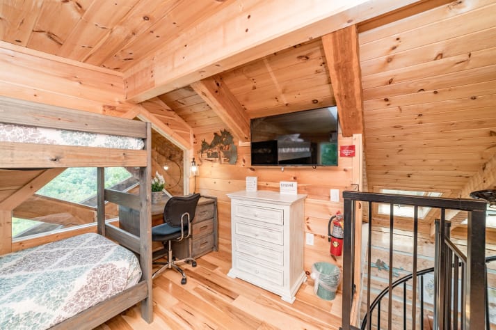 Loft area with bedrooms and TV. Pigeon Forge, Tennessee Cabin Rental - Gallery Image #26