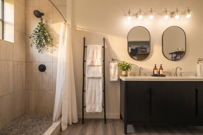 Spa-style bath with double vanity and walk-in tile shower. Douglas Lake, Tennessee Cabin Rental - Gallery Image #33