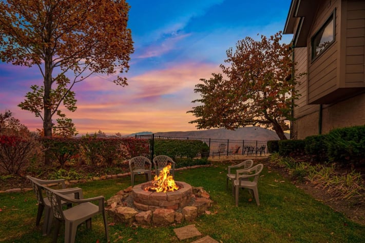 Outdoor fire pit with wood provided. Pigeon Forge, Tennessee Lodge Rental - Gallery Image #4