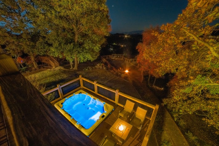 Infinity hot tub for 9 people, open year round. Pigeon Forge, Tennessee Cabin Rental - Gallery Image #13