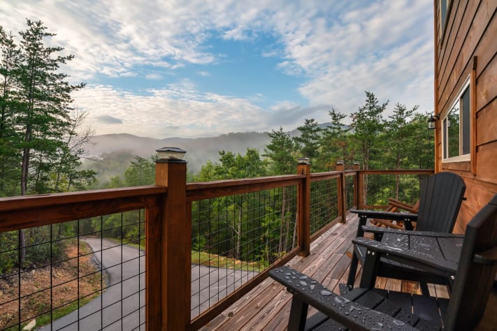 Take in sweeping mountain views from your own private deck — a quiet spot to slow… Sevierville, Tennessee Cabin Rental - Gallery Image #3