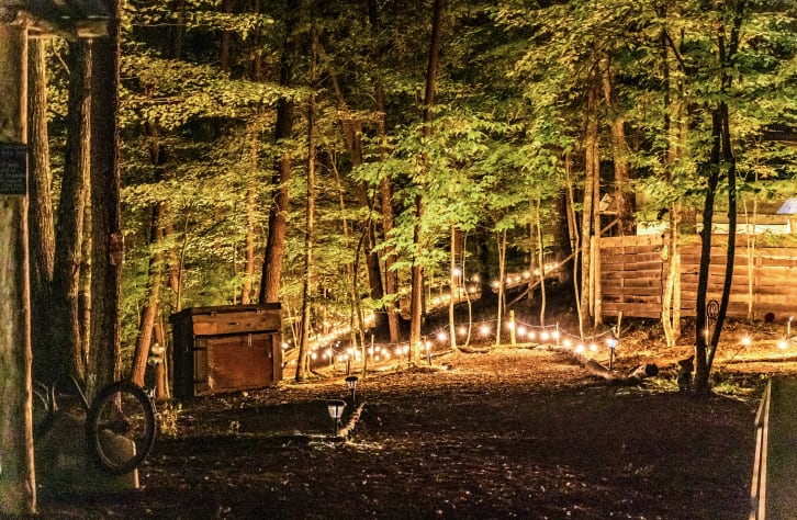 View of canopy ridge at night. This cabin is beside the canopy ridge tents, which… Pigeon Forge, Tennessee Cabin Rental - Gallery Image #21