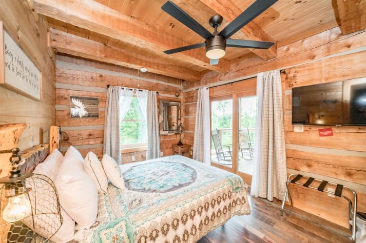 Queen bedroom on main level.  Pigeon Forge, Tennessee Cabin Rental - Gallery Image #34