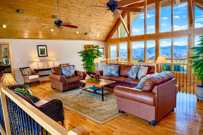 Third floor landing with queen sofa bed and sitting area. Mountain views front and… Pigeon Forge, Tennessee Lodge Rental - Gallery Image #26