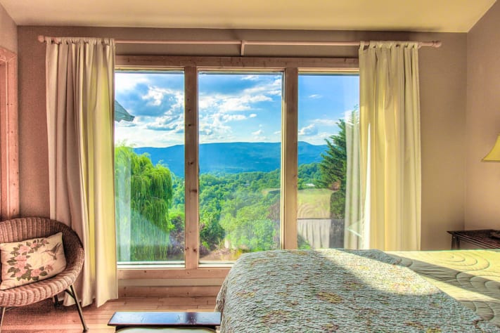 Third floor King Bedroom with Sunset Mountain View. Pigeon Forge, Tennessee Lodge Rental - Gallery Image #35