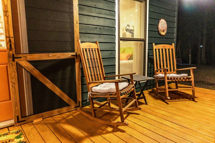 The front porch with its relaxation rockers! Pigeon Forge, Tennessee Cabin Rental - Gallery Image #3