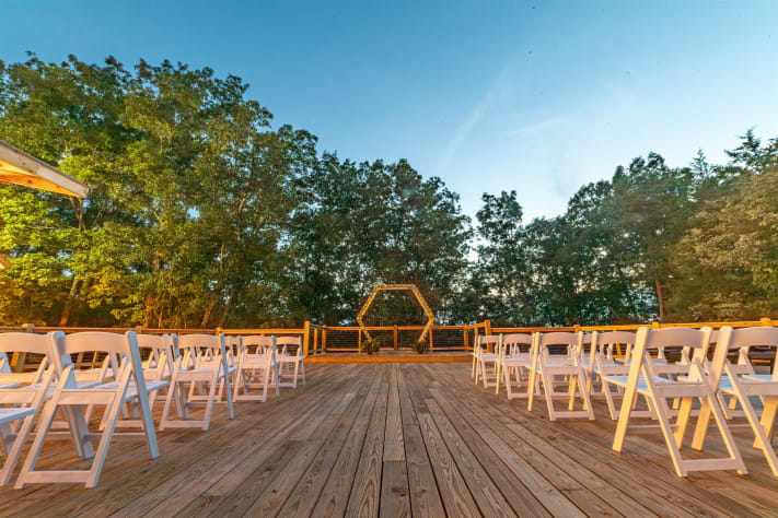 Deck in backyard that can seat up to 100. Perfect for a wedding! Sevierville, Tennessee Cabin Rental - Gallery Image #3