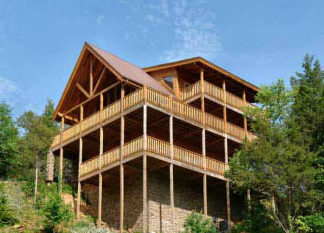 Exterior of the three story Luxury Cabin which overlooks the community pool. Pigeon Forge, Tennessee Cabin Rental - Gallery Image #4