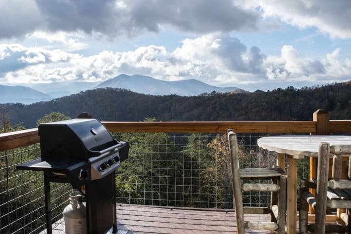 Upper Deck with gas grill and pub table Pigeon Forge, Tennessee Cabin Rental - Gallery Image #17