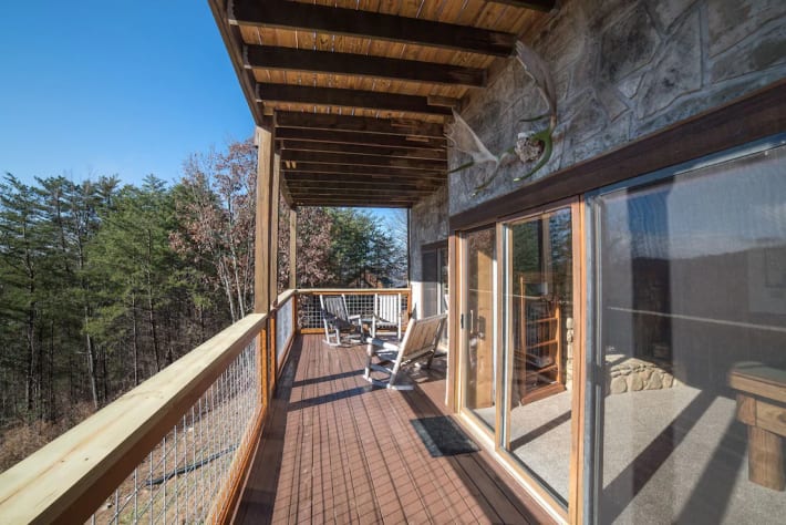 Lower deck with enough sitting Pigeon Forge, Tennessee Cabin Rental - Gallery Image #24