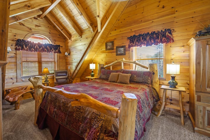 Upstairs King Master Suite with bath and garden tub with adjoining porch. Pigeon Forge, Tennessee Cabin Rental - Gallery Image #11