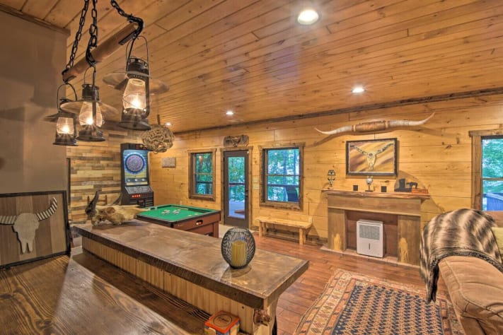 Bar with saddle barstools and game room complete with bumper pool, foosball and… Nantahala Lake, North Carolina Cabin Rental - Gallery Image #14
