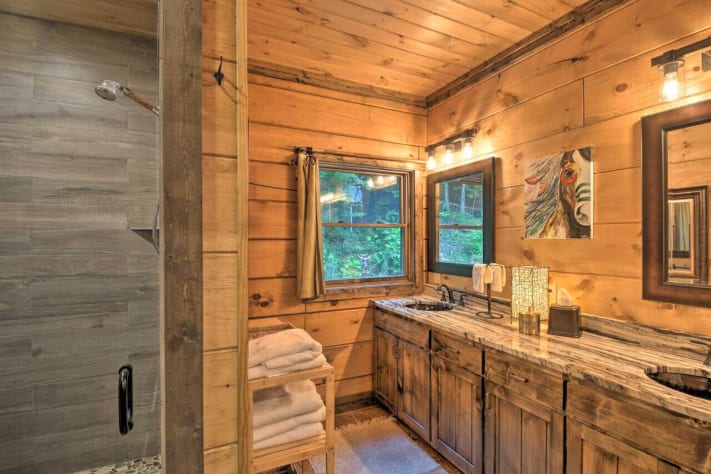 Primary full bathroom with oversized walk-in shower and double vanity Nantahala Lake, North Carolina Cabin Rental - Gallery Image #18