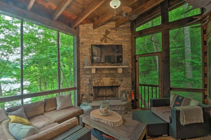 Outdoor living room with fireplace; great place to watch the game! Nantahala Lake, North Carolina Cabin Rental - Gallery Image #19