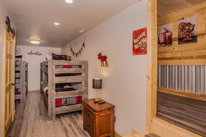 6 bunk beds next to the movie room! Pigeon Forge, Tennessee Cabin Rental - Gallery Image #16