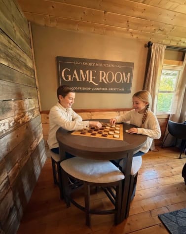 Enjoy the beautiful Smoky Mountain game room! Play checkers or chess on a custom… Gatlinburg, Tennessee Cabin Rental - Gallery Image #9