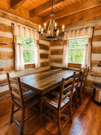 Large dining table, seats 7 or 8 and more seating at the counter and on the decks. Gatlinburg, Tennessee Cabin Rental - Gallery Image #13