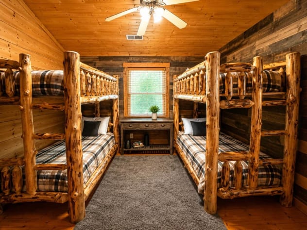 The kids will love this super fun bunk room with knotty pine bunks, premium mattresses… Gatlinburg, Tennessee Cabin Rental - Gallery Image #20