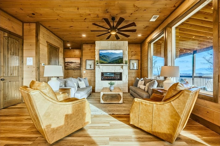 Settle into the overstuffed couch with a book while the mountains fade to dusk outside Sevierville, Tennessee Cabin Rental - Gallery Image #11