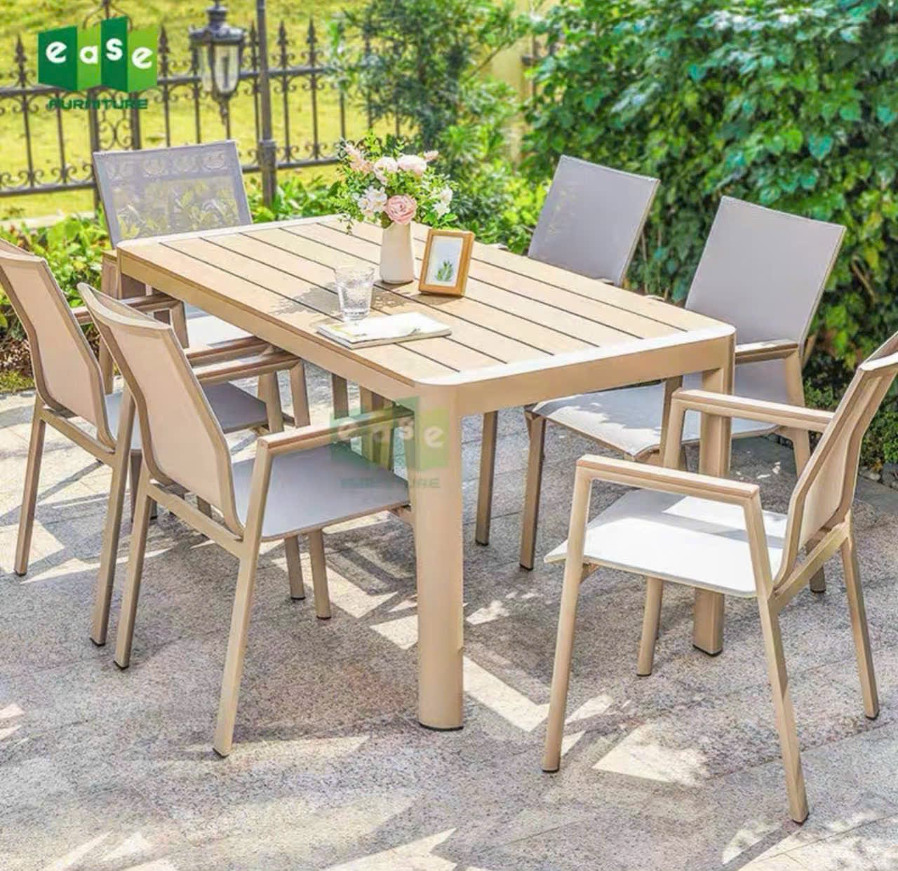 Bàn ghế gỗ nhựa ngoài trời tiện dụng - ảnh 1