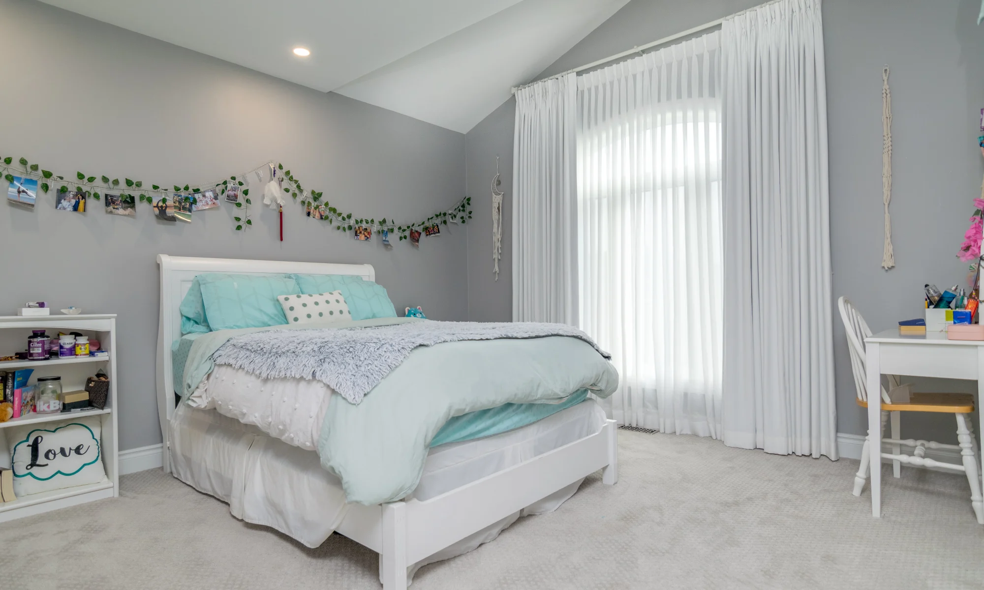 Girls room with sheers and linen drapes for blackout sleeping
