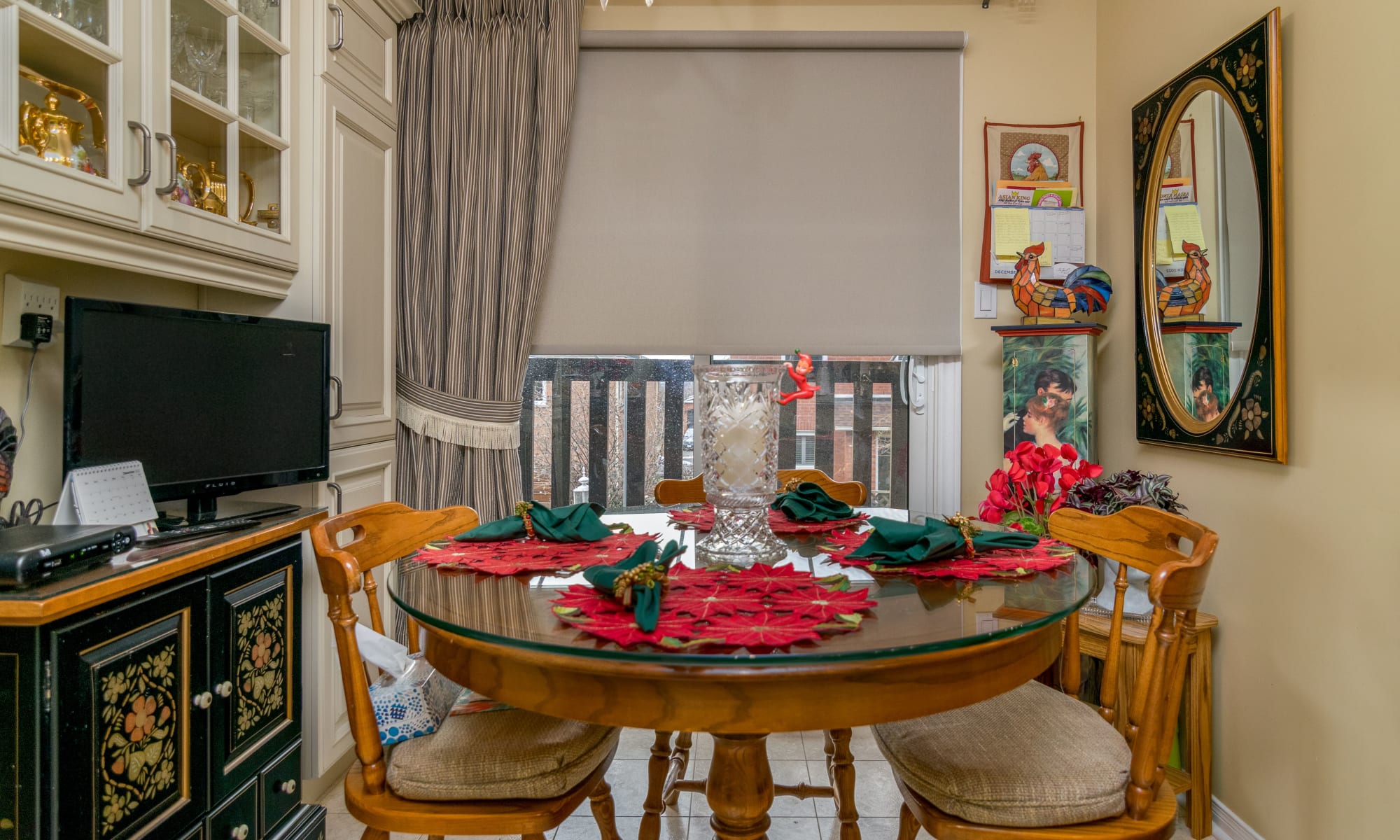 Custom drapes with bold fabric and a roller blind