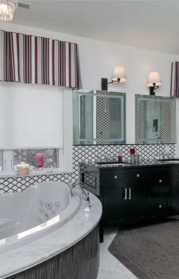 Master bathroom with light filtering roller blinds and box pleat valances
