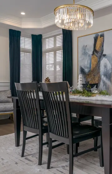 This eloquent dinning room has super soft black velvet side panels