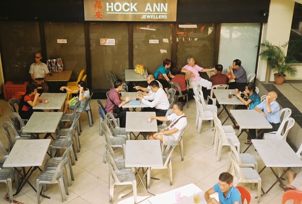 People talking in foodcourt in Bugis Singapore