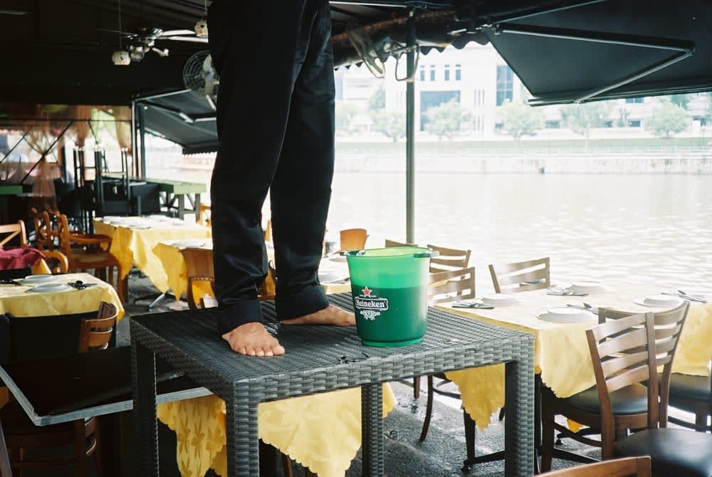 man standing on table