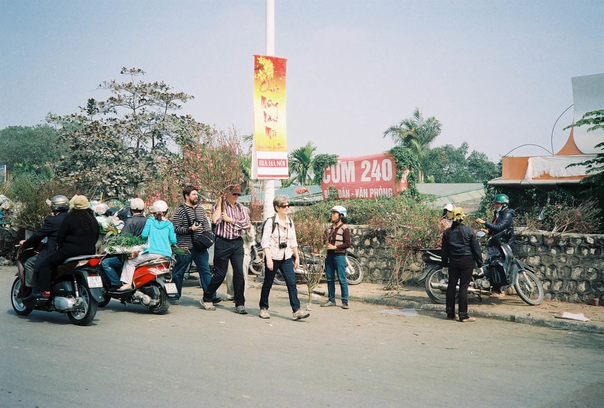 people walking at flower market Hanoi